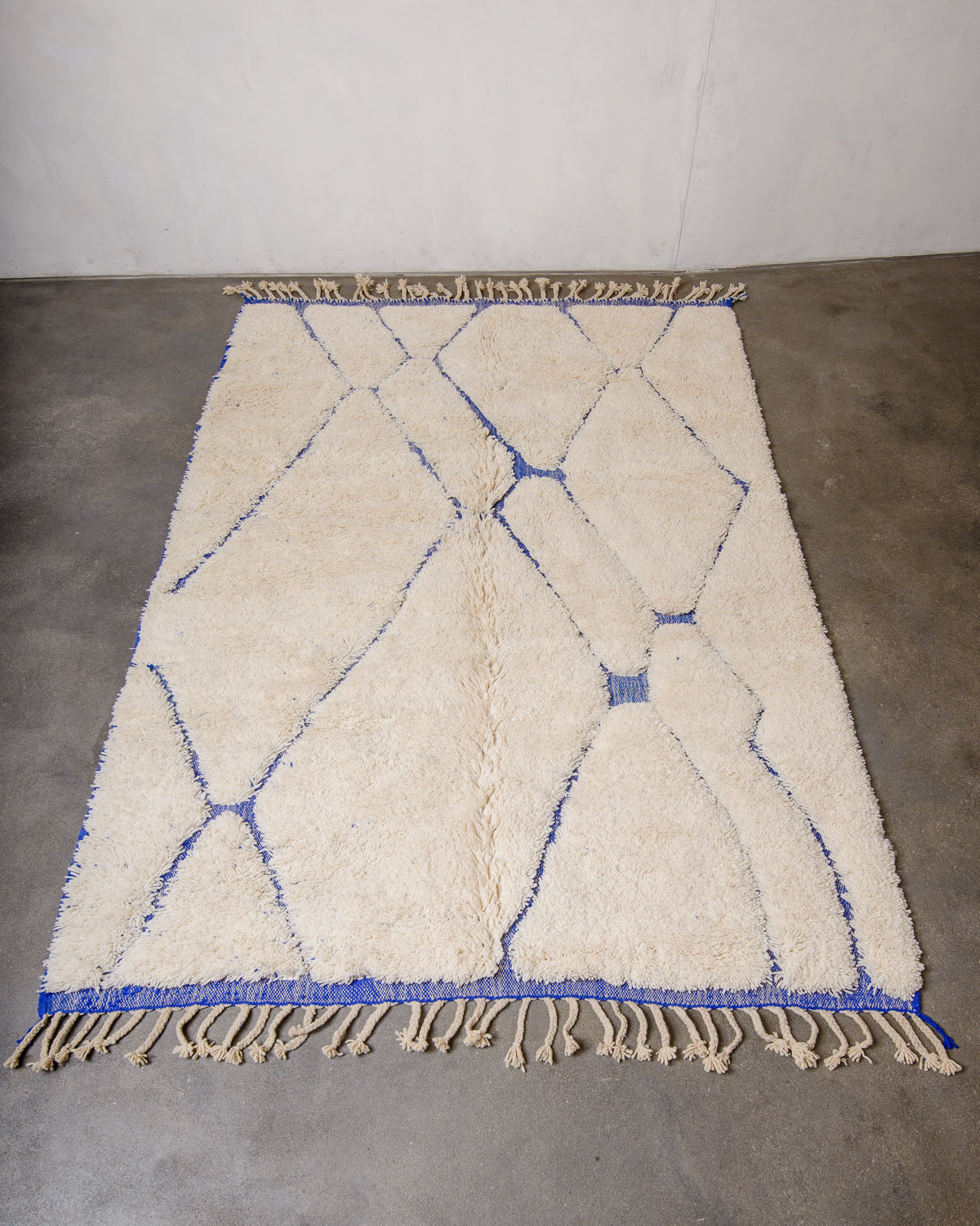 Modern, designer, handcrafted Berber rug from Morocco. Beniourain carpet with beautiful colours and patterns and fluffy wool texture.
